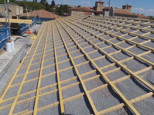 Pose de l'écran sous toiture et des liteaux